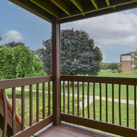 Thumbnail 4 of 11 a view of the yard from the deck of a home at Old Monterey Apartments, Springfield, MO, 65807