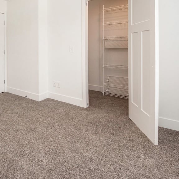 Thumbnail 7 of 7 Bedroom with a walk-in closet at North Pointe Apartments in Elkhart, IN