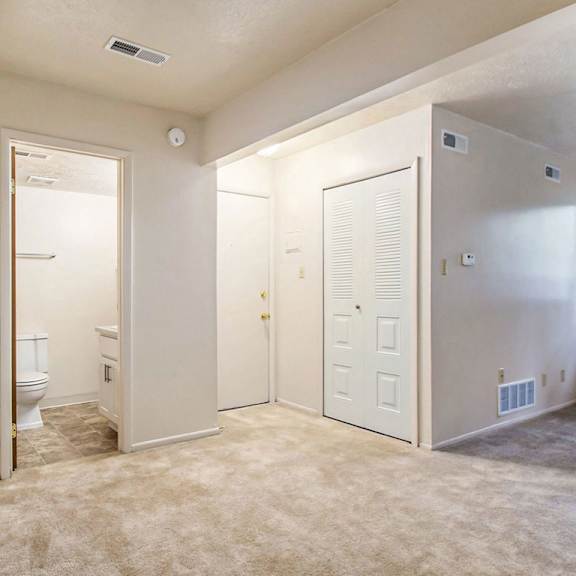 Thumbnail 3 of 8 An entryway, a bathroom, and a closet at Normandy Village Apartments, Michigan City, 46360