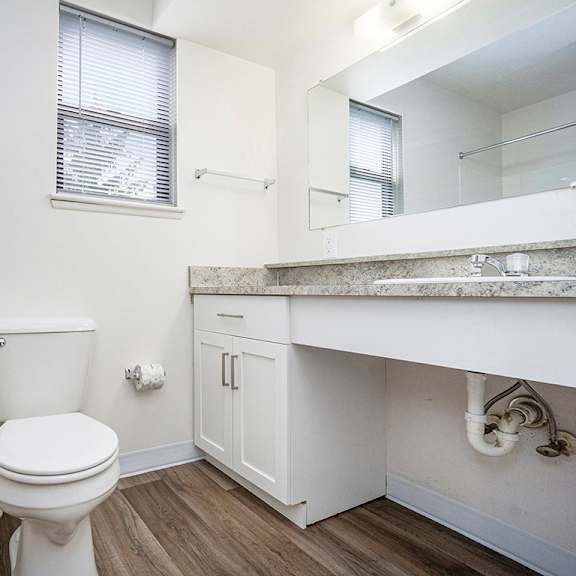Thumbnail 9 of 10 A bathroom with a window at North Pointe Apartments, Elkhart, IN, 46514