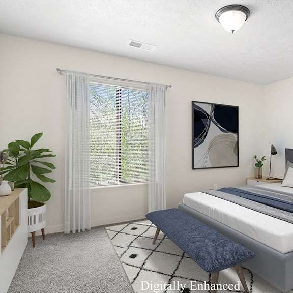 Thumbnail 12 of 13 A bedroom with a large bed and a window with curtains at Old Farm Apartments, Elkhart, 46517