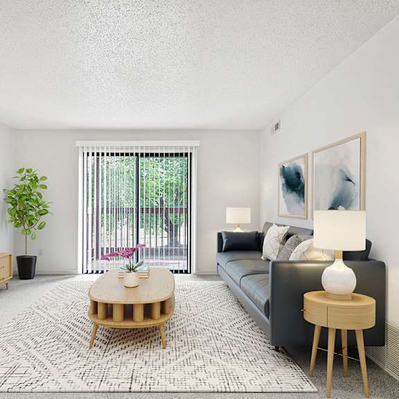 Thumbnail 3 of 15 living room with a sliding glass door to a balcony at Old Monterey Apartments, Missouri, 65807