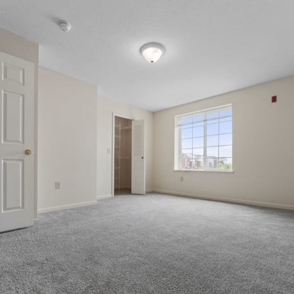 Thumbnail 12 of 18 bedroom with a walk in closet at Hunters Pond Apartment Homes, Champaign, IL, 61820