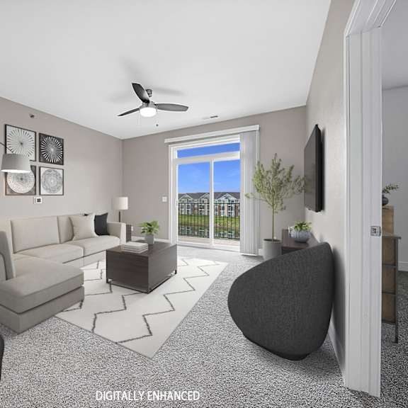 Thumbnail 3 of 10 A modern living room with a 9' ceiling at The Reserve Apartment Homes in Grimes, Iowa
