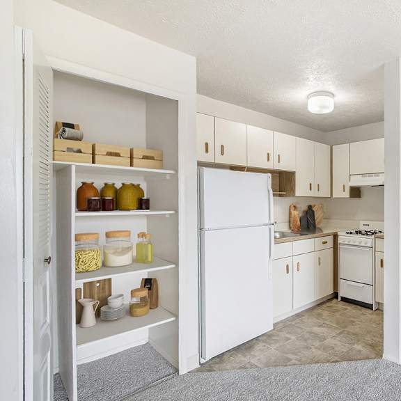 Thumbnail 11 of 13 studio kitchen with large closet at Seville Apartments in Kalamazoo, MI 49009