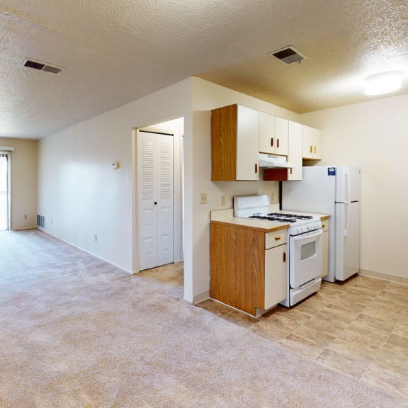 Thumbnail 4 of 10 spacious living, dining and kitchen areas at Seville Apartments, Michigan, 49009