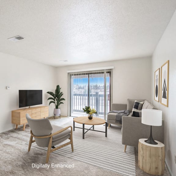 Thumbnail 3 of 13 a living room with a slider to a balcony at Seville Apartments, Kalamazoo, MI, 49009
