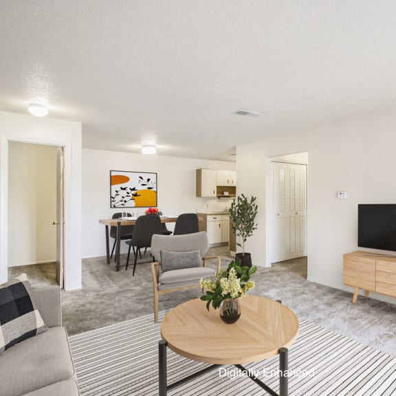 Thumbnail 5 of 13 a living room and dining room at Seville Apartments, Kalamazoo, MI, 49009