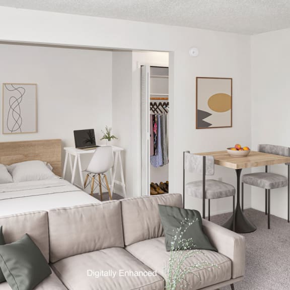Thumbnail 7 of 12 a living room with a sleeping area at Seville Apartments, Kalamazoo, 49009