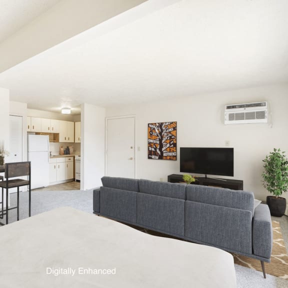 Thumbnail 5 of 12 studio living areas with furniture at Seville Apartments in Kalamazoo, MI 49009