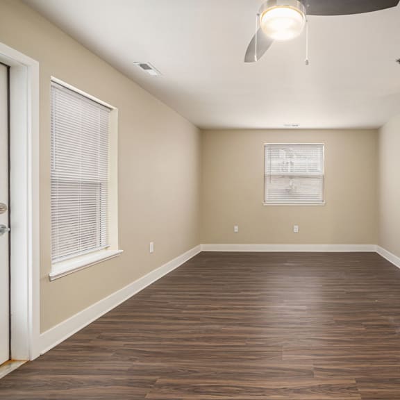 Thumbnail 6 of 12 an end style living room with an extra window  at Signature Pointe Apartment Homes, Athens, 35611