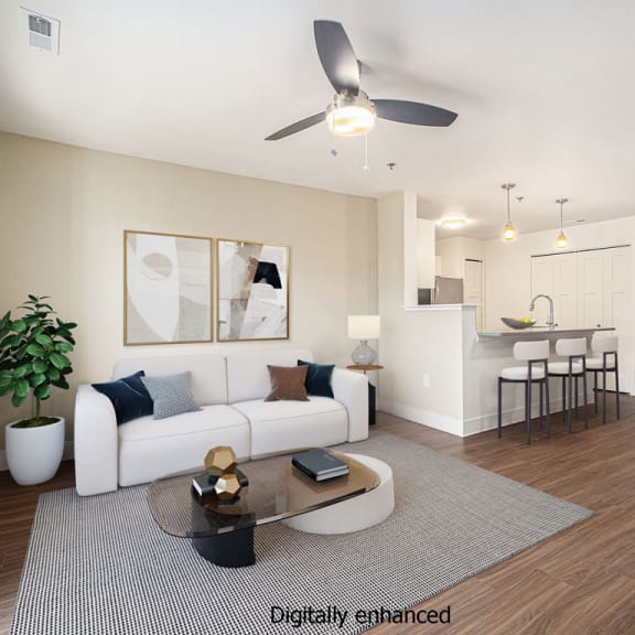 Thumbnail 3 of 14 living room with ceiling fan at Signature Pointe Apartment Homes in Athens, AL