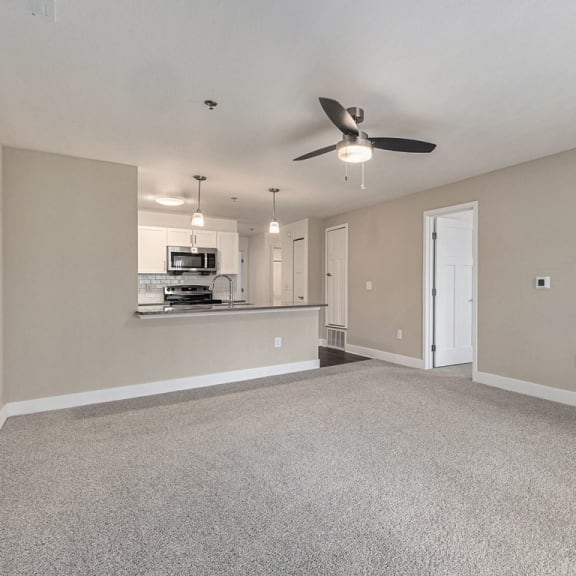 Thumbnail 10 of 22 spacious living room with a ceiling fan  at Signature Pointe Apartment Homes, Athens, AL