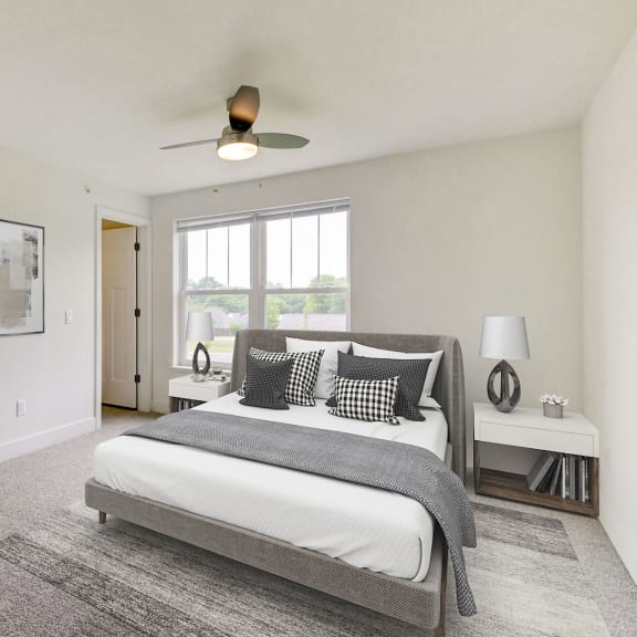 Thumbnail 15 of 22 a bedroom with a bed and a ceiling fan  at Signature Pointe Apartment Homes, Athens, AL, 35611