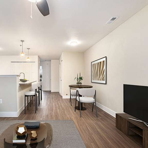 Thumbnail 7 of 14 living, dining, and kitchen areas with hard surface floors at Signature Pointe Apartment Homes in Athens, AL