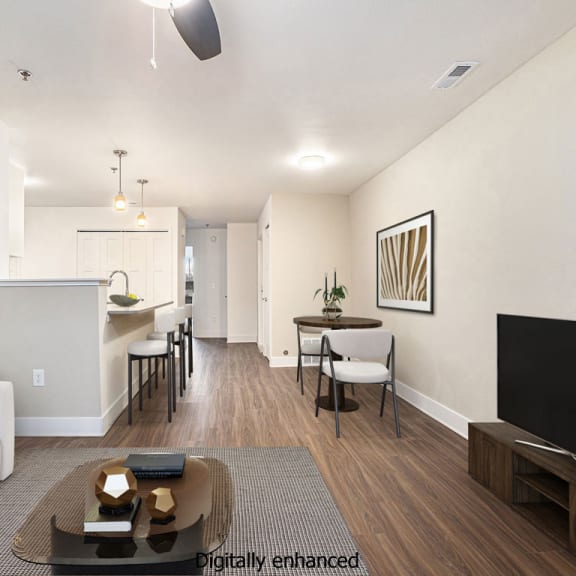 Thumbnail 6 of 10 a living room and kitchen with hard surface flooringat Stoney Pointe Apartment Homes, Wichita, 67226