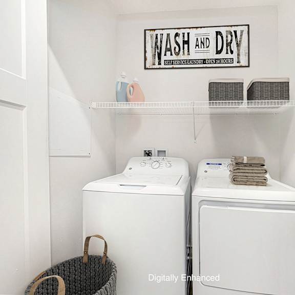 Thumbnail 9 of 14 a washer and dryer in the laundry room of a home at Strathmore Apartment Homes, West Des Moines, Iowa