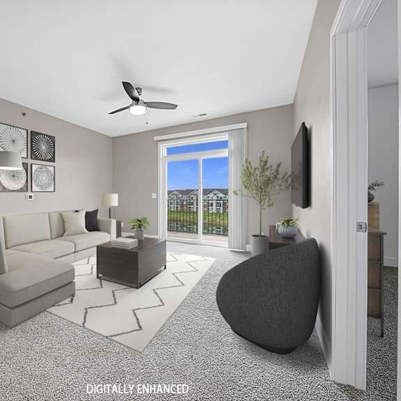 Thumbnail 3 of 14 A modern living room with a 9' ceiling and a grey sofa at Strathmore Apartment Homes, West Des Moines, Iowa