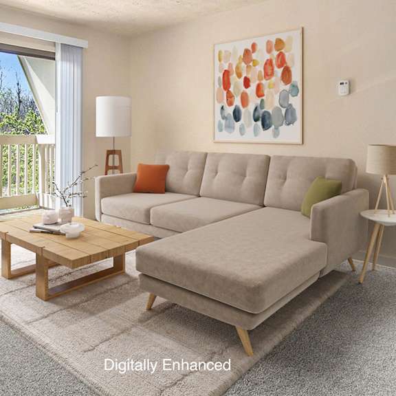 Thumbnail 3 of 10 A living room with plush carpet and a slider to a balcony at Swiss Valley Apartments, Wyoming, MI