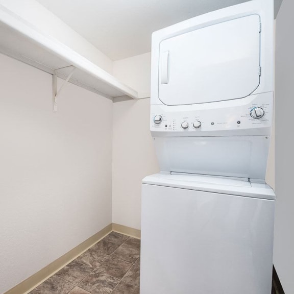 Thumbnail 15 of 20 closet with washer and dryer at Tanglewood Apartments, Oak Creek, WI, 53154