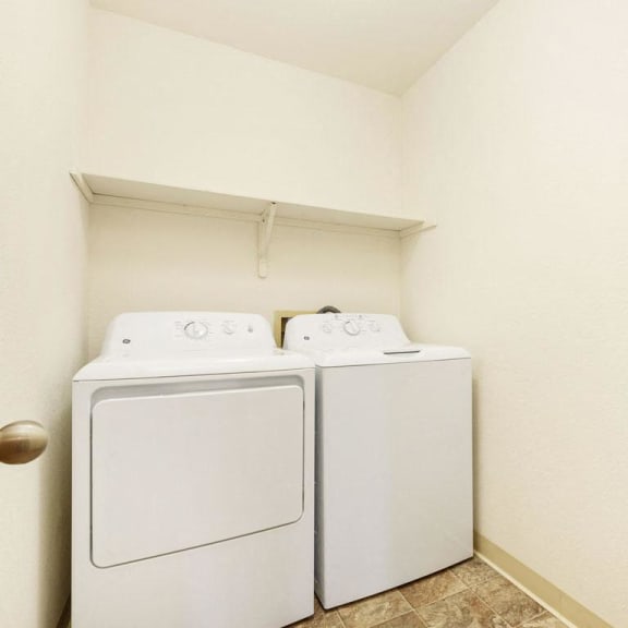 Thumbnail 7 of 11 a laundry room with a washer and dryer in it at Tanglewood Apartments, Oak Creek, WI