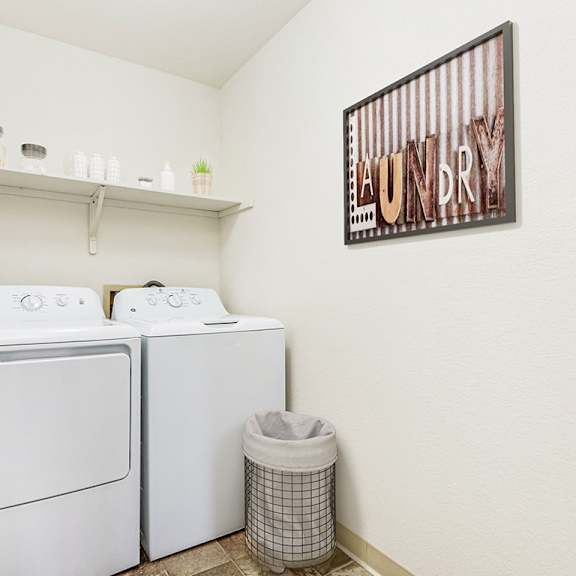 Thumbnail 8 of 12 a laundry room with a washer and dryer in it at Tanglewood Apartments, Oak Creek, WI