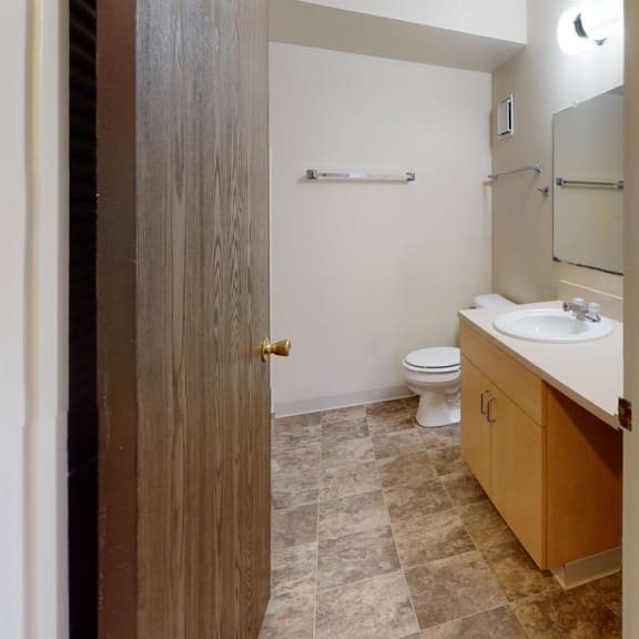 Thumbnail 6 of 9 2BCC-Bath1plan at Trappers Cove Apartments, Michigan