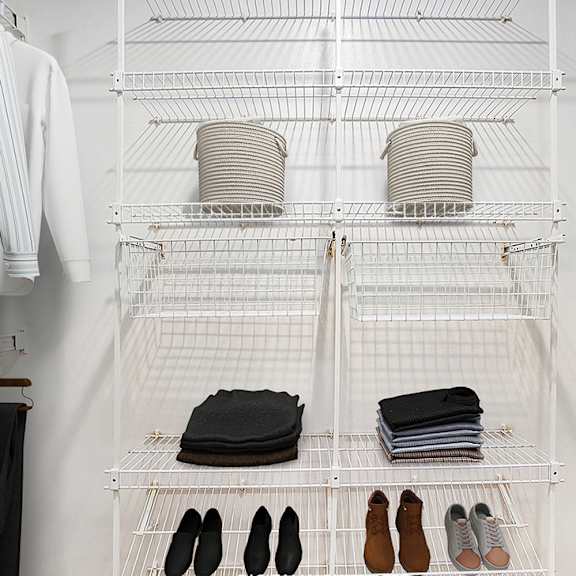 Thumbnail 16 of 17 A closet with wardrobe organizers at West Hampton Park Apartments in Elkhorn, NE 68022