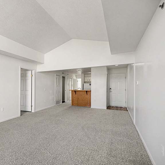 Thumbnail 5 of 19 A spacious dining room with a carpeted floor and white walls  at West Hampton Park Apartment Homes, Nebraska, 68022