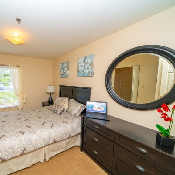 Thumbnail 12 of 14 A spacious bedroom with large windows and a walk in closet at West Hampton Park Apartment Homes, Elkhorn, 68022