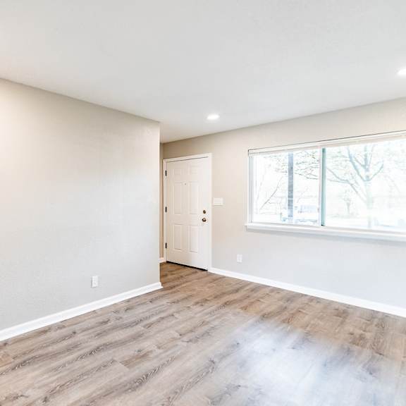 a room with a window and a door.