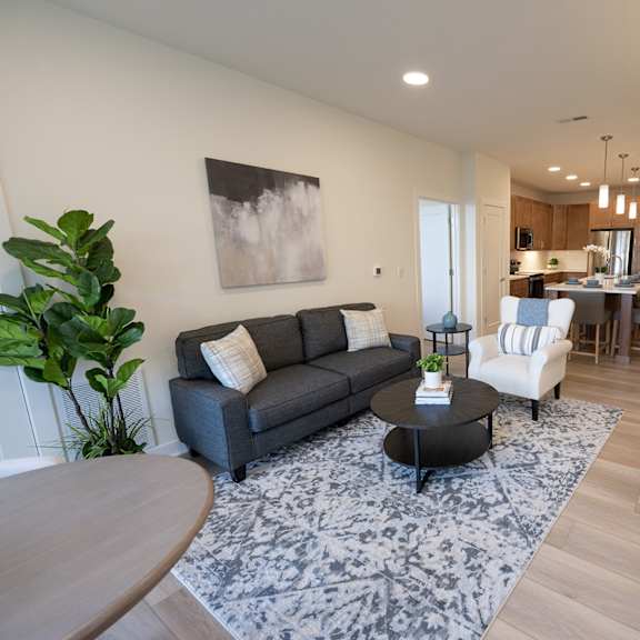 a living room with a couch and a table