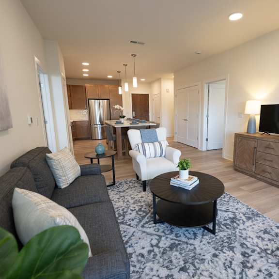 a living room with a couch and a table