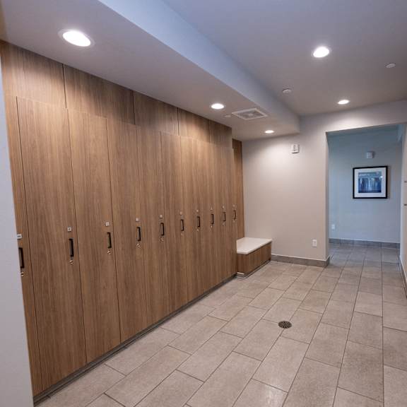 a row of wood lockers in one of the locker rooms.