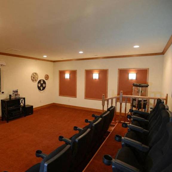 theatre with large screens at highlands at riverwalk apartments 55+, 10954 n cedarburg road