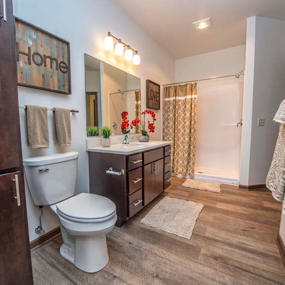 a bathroom with a toilet and a sink