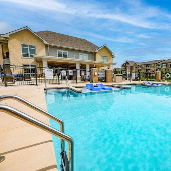 our apartments have a large resort style pool with lounge chairs