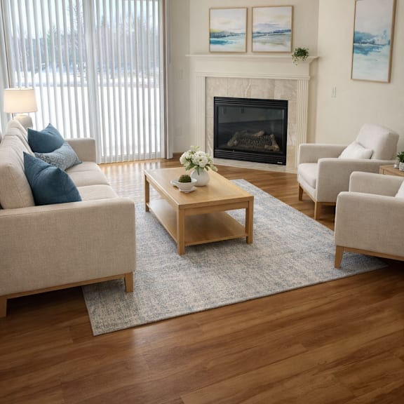 a living room with a fireplace and a couch.