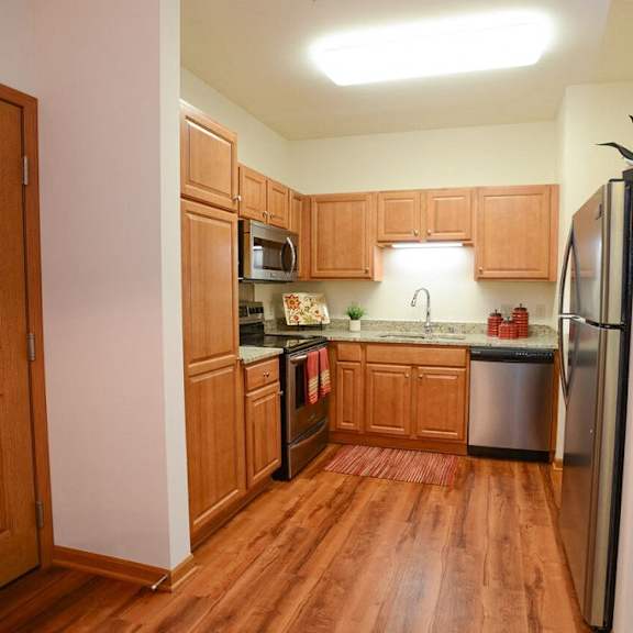 hardwood laminate flooring at highlands at riverwalk apartments 55+, mequon, wi,53092
