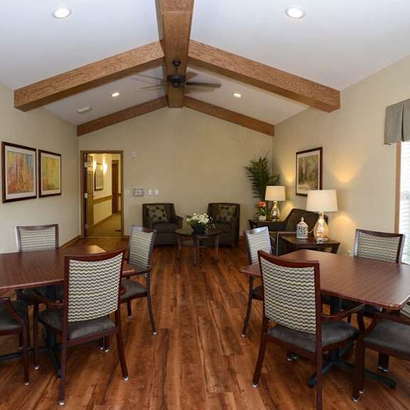 large community room with board games at highlands at riverwalk apartments 55+, mequon, wi,53092