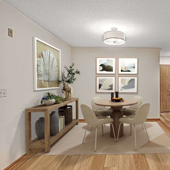 a dining room with a table set for four.