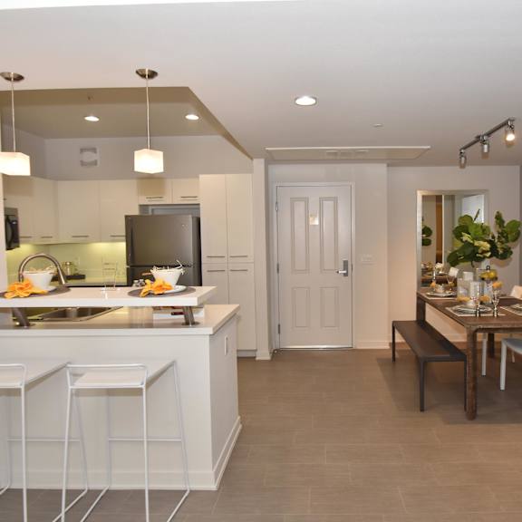 kitchen with bar area at casa mira view apartments, san diego, ca