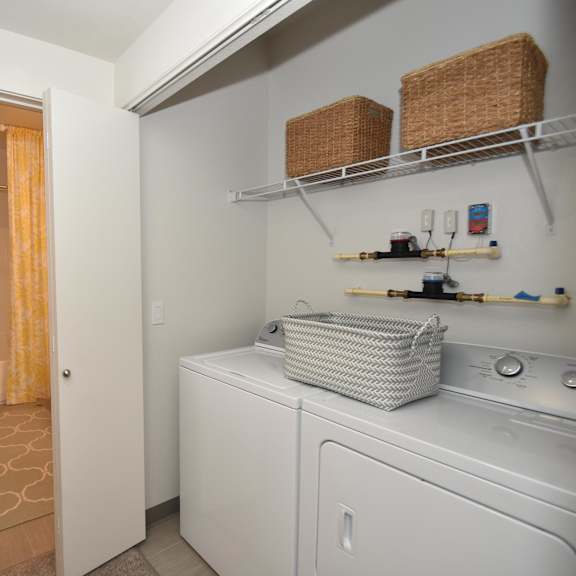 small laundry room at casa mira view apartments, san diego, california
