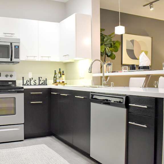 kitchen with dishwasher at casa mira view apartments, san diego, ca, 92126