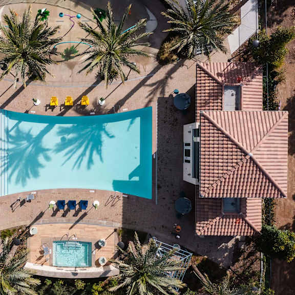 drone view of a pool at casa mira view apartments, san diego, ca