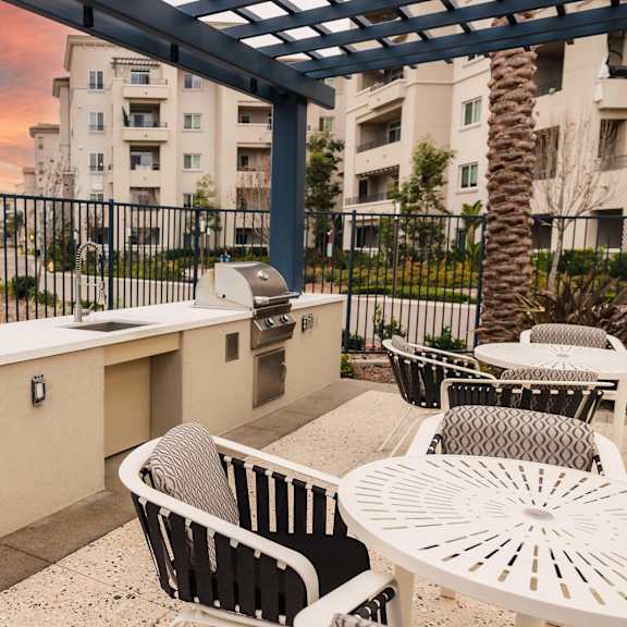 patio with a grill at casa mira view apartments, california, 92126