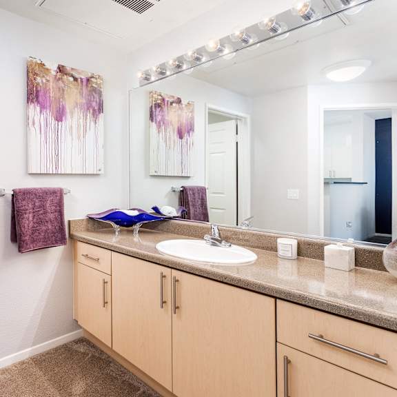 bathroom with storage area at la jolla crossroads apartments, california, 92122