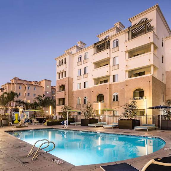 pool view in night at la jolla crossroads apartments, san diego