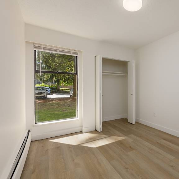 a room with a window and a door.
