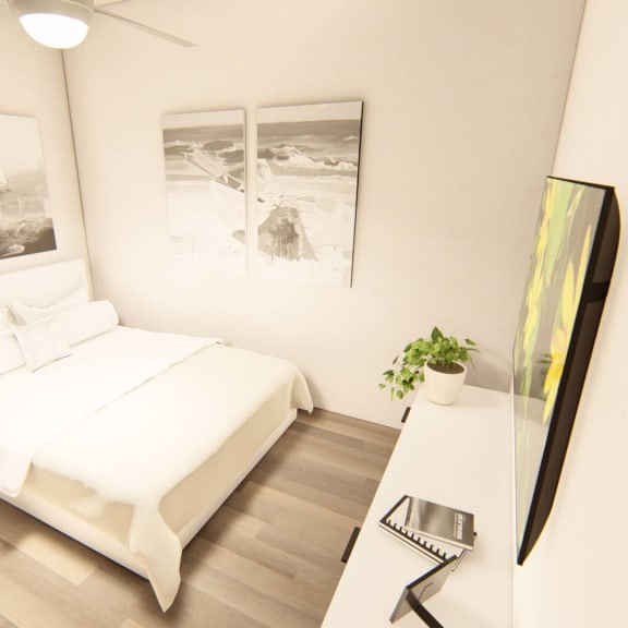 Thumbnail 10 of 12 a bedroom with a bed and a desk at Brownstones at Palisade Park Townhomest, Broomfield Colorado